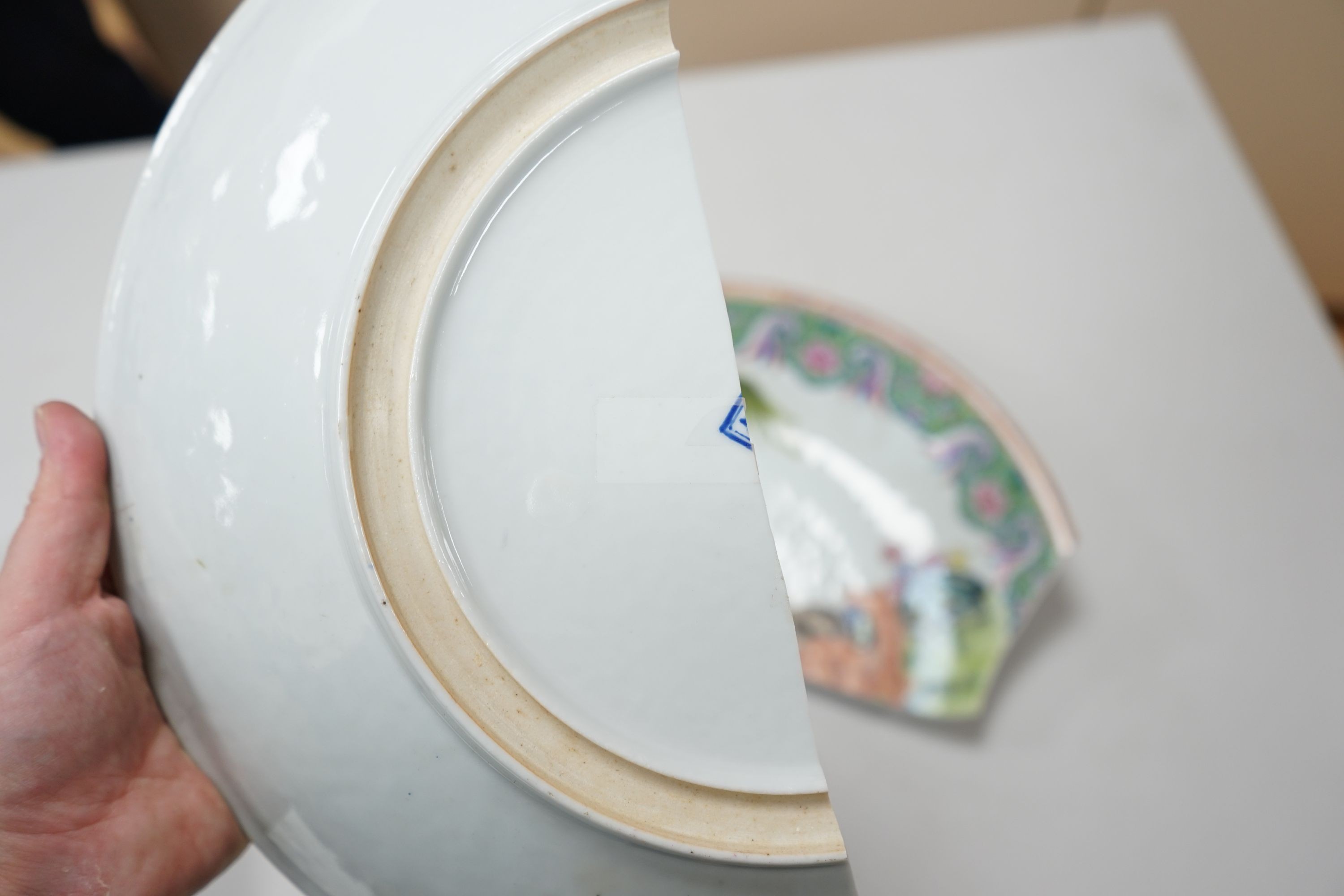A 19th century Japanese Imari dish, 30cm and a damaged Chinese famille rose dish, 33.5cm 34cm